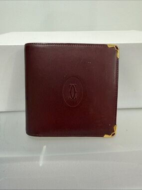 Cartier Must de Cartier Leather Bifold Wallet in Burgundy with Gold Corners